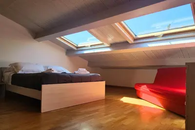 Letto o letti in una camera di Rotolo Suite 601