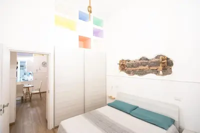 Letto o letti in una camera di Casa del Mare Acitrezza