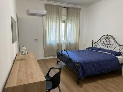 Letto o letti in una camera di CasaTua