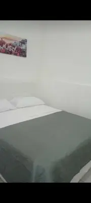 Letto o letti in una camera di Faraglioni inn