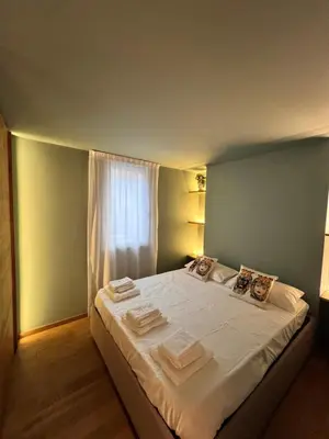 Letto o letti in una camera di LA DIMORA DEI MORI