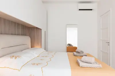 Letto o letti in una camera di Giardina's Apartment Catania