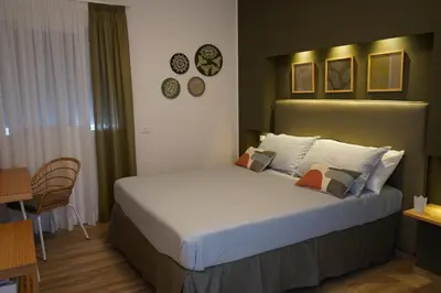 Letto o letti in una camera di Viscalori Homes