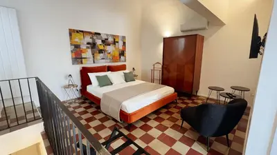 Letto o letti in una camera di 169Home