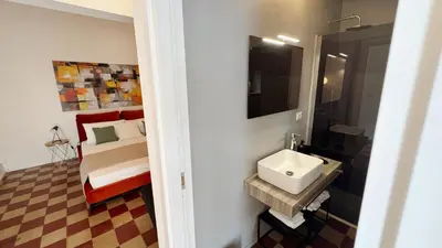Letto o letti in una camera di 169Home