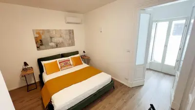 Letto o letti in una camera di 169Home