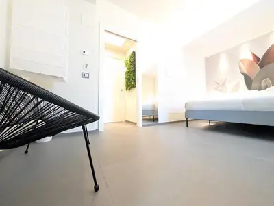 Letto o letti in una camera di Etna Stone Rooms