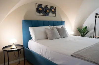 Letto o letti in una camera di Sicily Loft