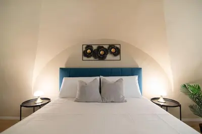 Letto o letti in una camera di Sicily Loft