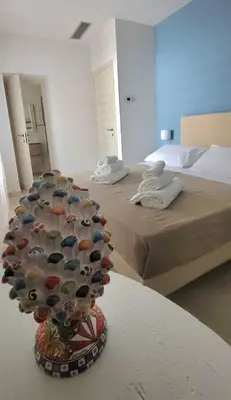 Letto o letti in una camera di Timpabella House
