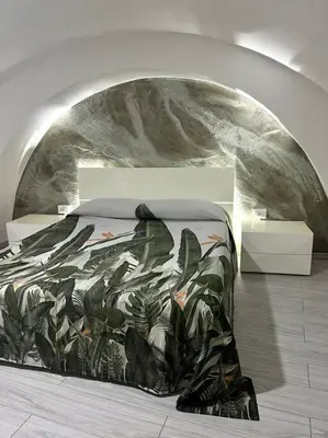 Letto o letti in una camera di IL PORTONCINO VERDE