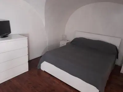 Letto o letti in una camera di Loft in centro Catania