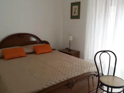 Letto o letti in una camera di La Via del Mare - Acireale Centro storico