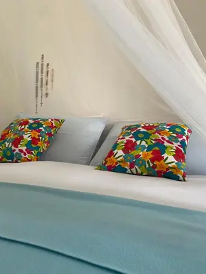 Letto o letti in una camera di Casa Bella