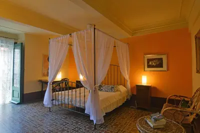 Letto o letti in una camera di Palazzo Nicotra Dimora Storica