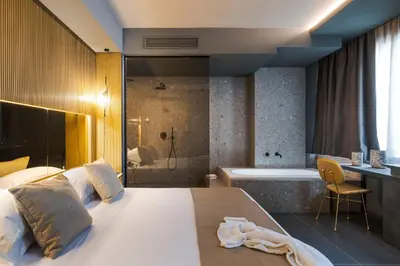 Letto o letti in una camera di Catania Smart Hotel