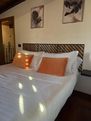 Letto o letti in una camera di R-HOME Li Cuti