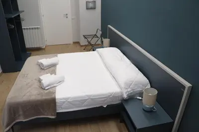 Letto o letti in una camera di IOLETTA HOUSE