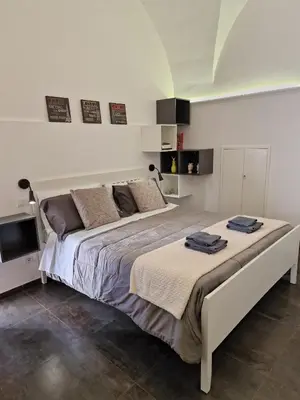Letto o letti in una camera di ReHouse