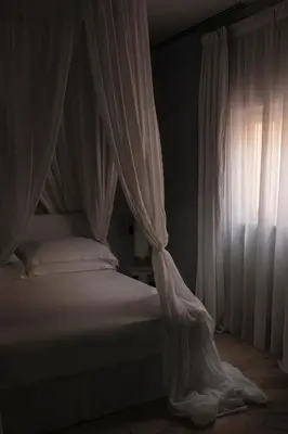 Letto o letti in una camera di ELLE dimora di Sicilia