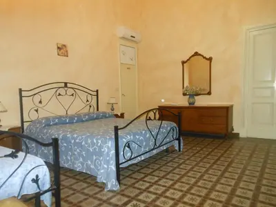 Letto o letti in una camera di Etna B&B