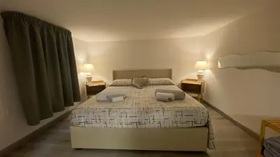 Letto o letti in una camera di Sweet Home Apartment city center