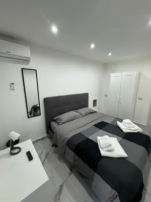 Letto o letti in una camera di Carlant Apartment