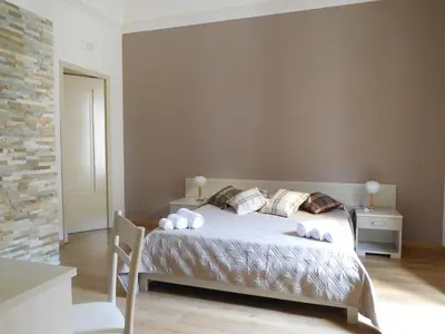 Letto o letti in una camera di Papali