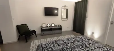 Letto o letti in una camera di Urban Suite