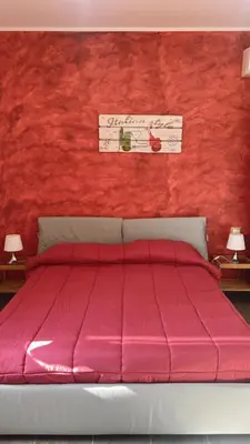 Letto o letti in una camera di Etna &Vita