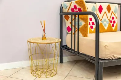 Letto o letti in una camera di Home City Town Catania