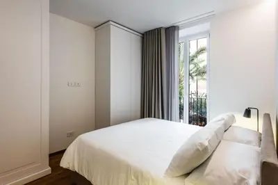 Letto o letti in una camera di Ferrini Home - Firenze 70