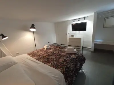 Letto o letti in una camera di GrotteBianche - Sicilian Apartment