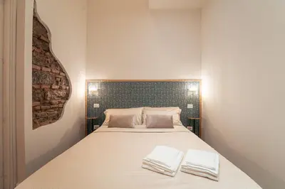 Letto o letti in una camera di Baroque design apartment in historical city center