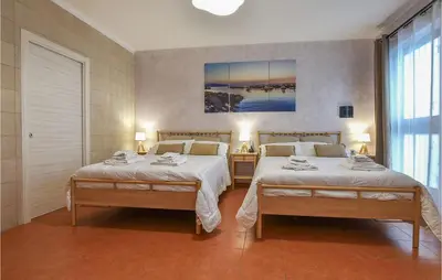 Letto o letti in una camera di Nice Home In Sant'alfio With Sauna