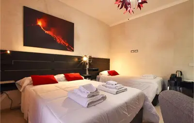 Letto o letti in una camera di Nice Home In Sant'alfio With Sauna
