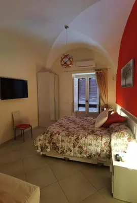 Letto o letti in una camera di Casa San Brasi di Mariano e Lucia