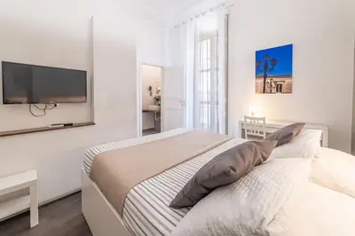 TV o dispositivi per l'intrattenimento presso Villa Bellini Luxury Home