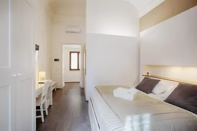Letto o letti in una camera di Villa Bellini Luxury Home