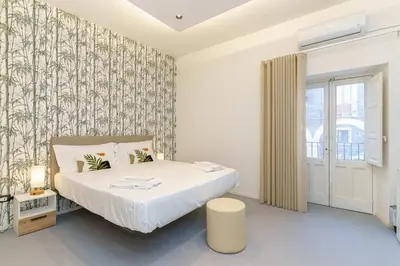 Letto o letti in una camera di Appartamento Curtis Palma