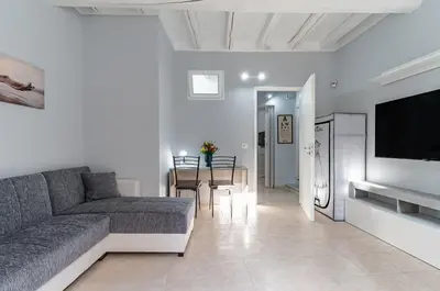 TV o dispositivi per l'intrattenimento presso GuestHost - Villa Bellini & Stadio Comfy Apartment