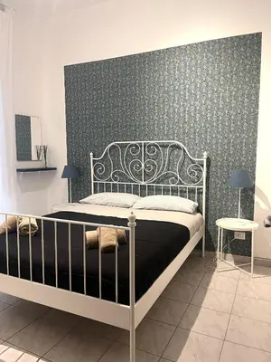 Letto o letti in una camera di Mongibello Apartment