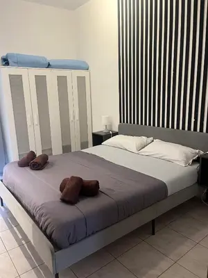 Letto o letti in una camera di Mongibello Apartment