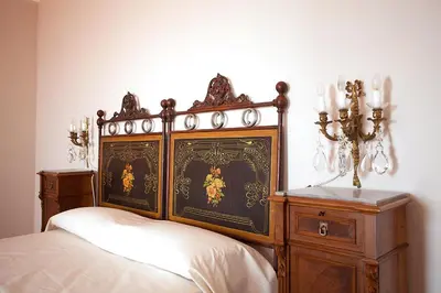 Letto o letti in una camera di Il Melograno