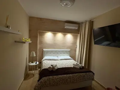 Letto o letti in una camera di Wanderlust maison de voyage