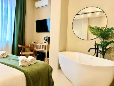 Letto o letti in una camera di CARBONE XXI