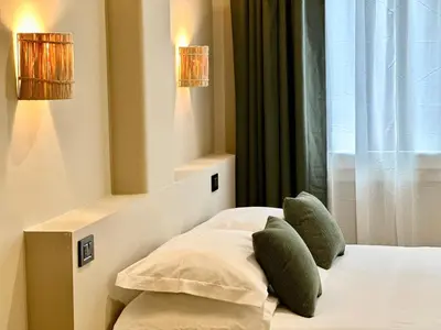 Letto o letti in una camera di CARBONE XXI