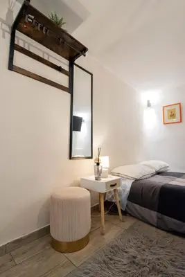 Letto o letti in una camera di Loft Pantano, Catania Center Villa Bellini