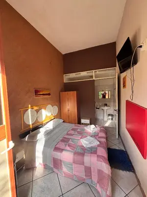 Letto o letti in una camera di LG Appartamento Turistico Acireale