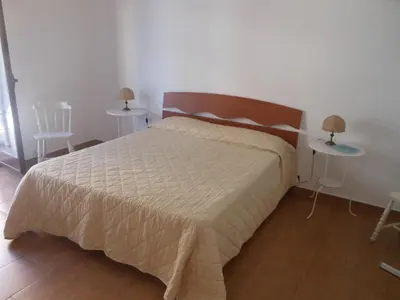 Letto o letti in una camera di Home Patrizia